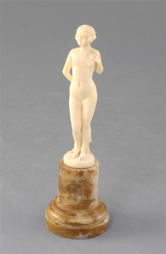 Joe Descamps. A 1930s carved ivory figure of a nude, height 5.75in.
